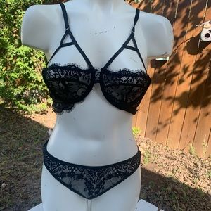 Brand new black lace lingerie set size Medium.